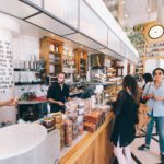 Woman standing on food counter