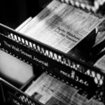 Newspapers on the Wall Street Journal rack