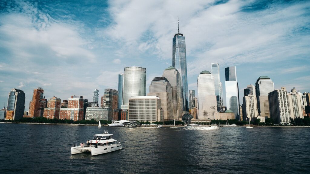 Freedom Tower under blue and white sky during daytime